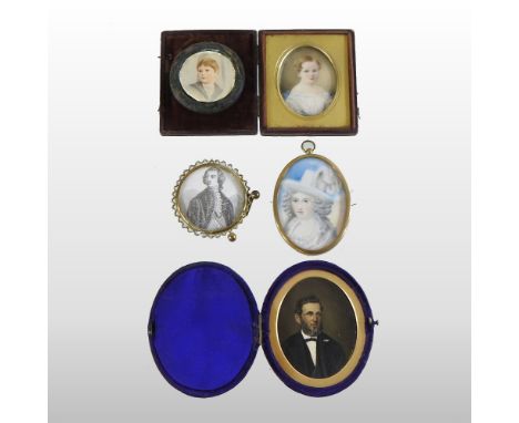 English School, (19th century), a portrait miniature of a young girls, wearing a white dress, oil, 6 x 5cm oval, in a hinged 