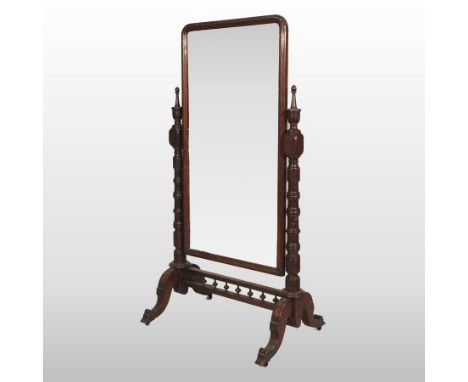 A Victorian oak framed cheval mirror, having an adjustable plate, on a splayed base, 91cm, 