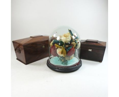 A George III rosewood tea caddy, of sarcophagus shape, with a fitted interior, 21cm wide,  together with another larger and a