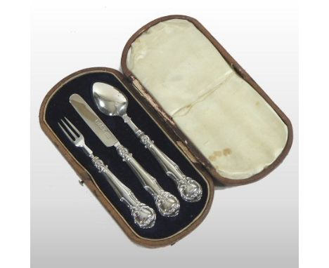 A Victorian silver christening set, comprising a children's knife, fork and spoon, by Hilliard and Thomason, Birmingham 1851,