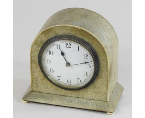 An Art Deco shagreen cased mantel clock, with a painted dial, on ivory feet, 15cm high