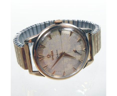 A 1960's vintage Omega 9 carat gold cased gentleman's wristwatch, having a signed dial with baton hours, on an expanding stra