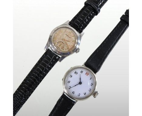 A 1940's Longines ladies wristwatch, the signed dial with Arabic hours and subsidiary seconds dial, on a leather strap, toget