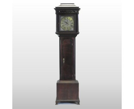 An 18th century and later oak cased longcase clock, the dial with pierced brass spandrels, the brass chapter ring showing Rom