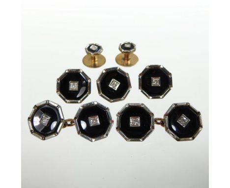 A set of early 20th century 9 carat and 18 carat gold, diamond and black enamelled dress studs, each of octagonal shape, comp