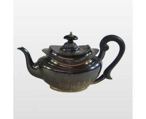 An Edwardian silver teapot and cover, with half gadrooned decoration, Sheffield 1904, 23cm long
