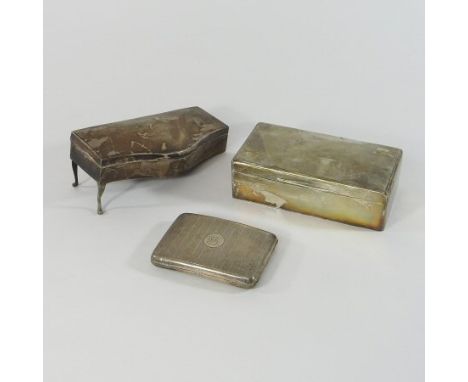 An early 20th century silver table cigarette box, by Walker and Hall, Sheffield, 1931, 18cm wide, together with a cigarette c