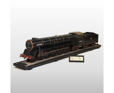 A mid 20th century scratch built live model of The Black Prince steam engine, with tender, 165cm long, on a model track, with