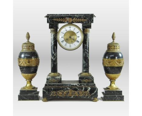 A 19th century marble three piece clock garniture, the portico case mounted with gilt metal decoration, the enamel chapter ri