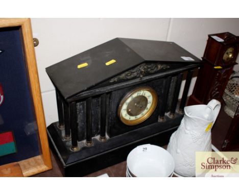 A large Victorian marble and slate mantel clock in architectural style case 