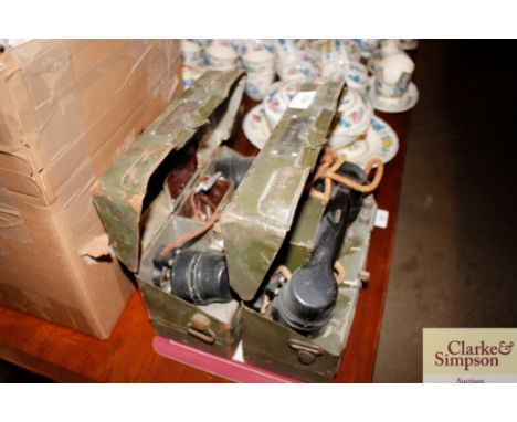 Two vintage field telephones