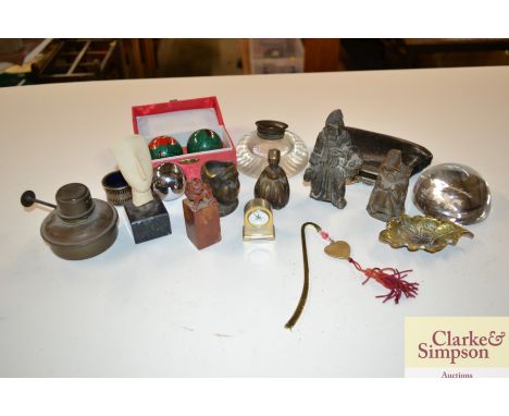 A box of miscellaneous items to include vintage inkwells, brass oil burner, metal ware figures, Chinese soapstone seal etc. 