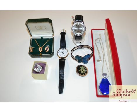 A quantity of various Timex and other wrist watches, silver jewellery etc.