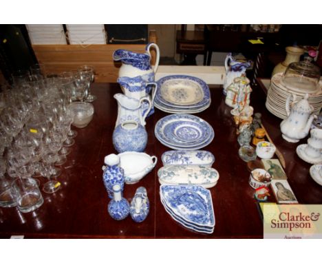 A quantity of Victorian and later blue and white china to include baluster water jugs, willow pattern meat plates, soap dishe