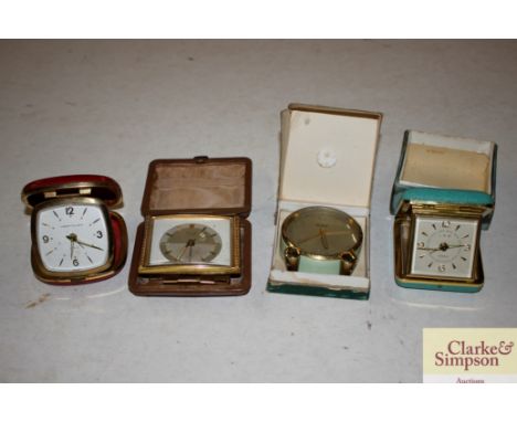 Four various vintage alarm clocks 