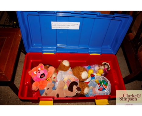 A large toy box on wheels containing various vintage soft toys, 1970/80's; building bricks and Teddy