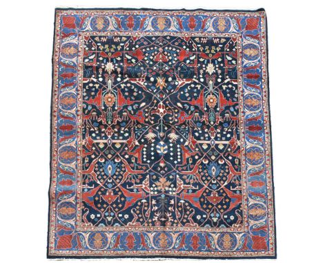 AN INDIAN CARPET With all over Persian designs  approximately 315cm x 250cm  Condition Report:  PLEASE NOTE: ALL LOTS ARE LOC