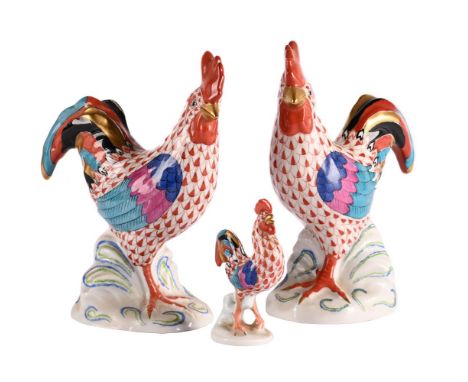 A PAIR OF HEREND MODELS OF ROOSTERS, AND ANOTHER SMALLER EXAMPLE 20TH CENTURY Each cock 14cm high, 12cm long respectively, th