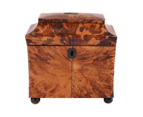 Y A GEORGE III TORTOISESHELL TEA CADDY LATE 18TH OR EARLY 19TH CENTURY With two internal lidded compartments  16cm high, 16cm