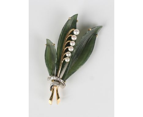 A gold, diamond, cultured pearl and nephrite brooch, circa 1950, designed as a spray of lily-of-the-valley, mounted with circ