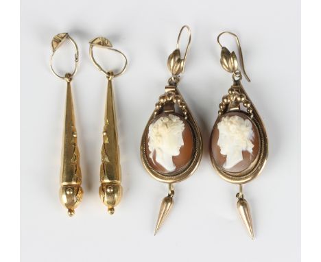 A pair of Victorian gilt metal and shell cameo earrings, circa 1860, each carved as a portrait of a lady with a beaded surmou
