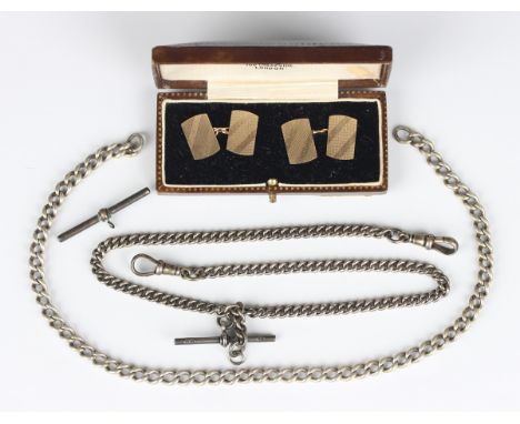 A pair of 9ct gold curved rectangular cufflinks with engine turned decoration, Chester 1928, weight 6.8g, dimensions of each 