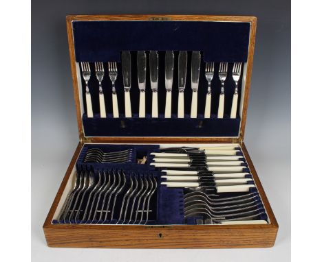 A Bravingtons canteen of plated Old English pattern cutlery, comprising six table knives and forks, four tablespoons, six des