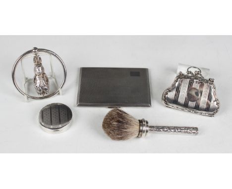 A George V silver purse with engine turned decoration, Birmingham 1918 by E.J. Houlston, width 8.8cm, a silver engine turned 