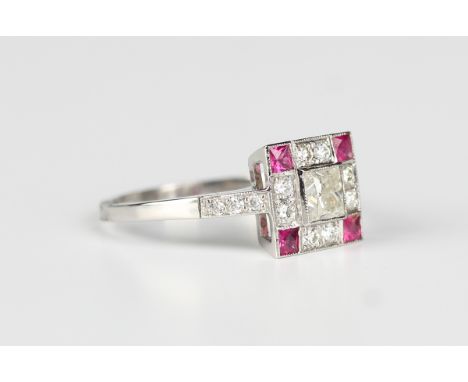 A platinum, ruby and diamond square cluster ring, collet set with the principal princess cut diamond to the centre, detailed 