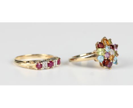 A 9ct gold, diamond and varicoloured gem set cluster ring, claw set with three circular cut diamonds, and coloured gemstones 