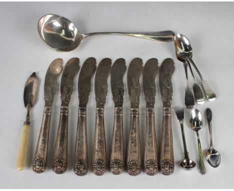 A set of eight Victorian silver Old English, Thread and Shell pattern fish knives, each shaped blade with engraved decoration