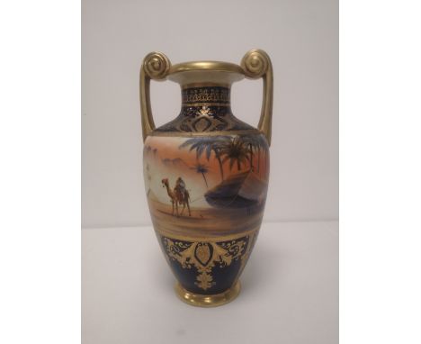 A Noritake vase painted with a camel in desert scene, 11" high.