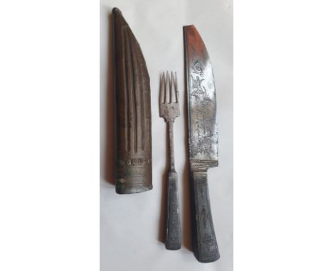 An antique knife &amp; fork, the knife blade with engraved inscription and figure, 10.75". (2)