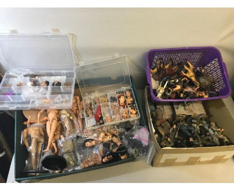 A Large collection of 1/6 scale action figure body parts, head sculpts, small 1/12 scale figures which includes Indiana Jones