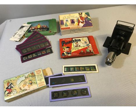 Vintage magic lantern with a collection of Walt Disney slides with boxes 
