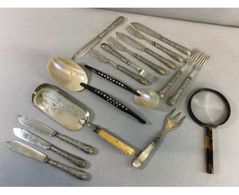 A Collection of silver plated ornate cutlery, Mother of pearl shell & horn handled serving spoons & Amber style magnifier 