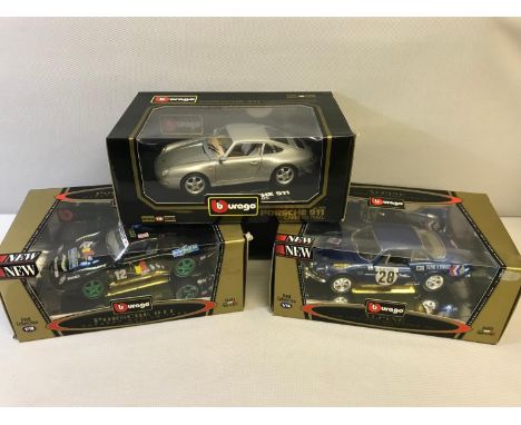 3 Burago 1/18 scale car models with boxes 