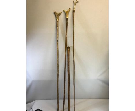 3 Vintage walking sticks with antler tops. Together with hand carved Oriental walking stick depicting Snake & Mouse 