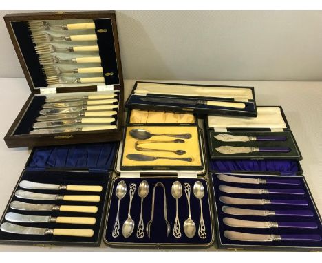 A collection of EP Flat wares in fitted boxes. Includes lovely ornate art nouveau style tea spoons and tong set 