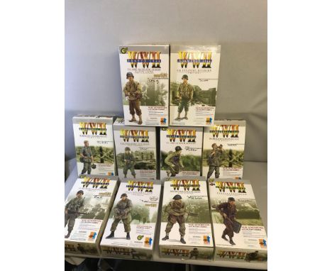 A Collection of 10 Dragon 1/6 scale military action figures. Figures are wearing accessories. Comes with boxes (Unchecked) 