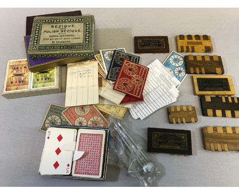 A Collection of Vintage WHIST MARKERS together with a collection of vintage playing cards and score boards 