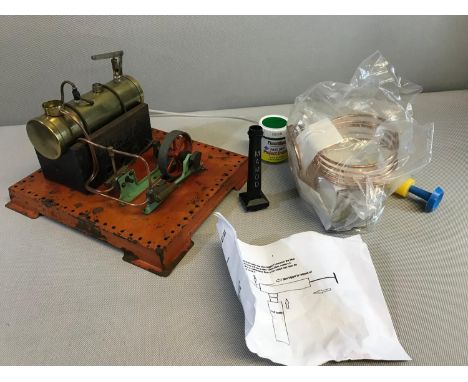Vintage Mamod steam engine circuit with a collection of spare parts 