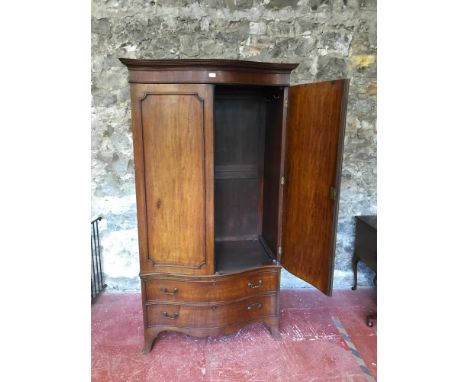 Large Victorian bow front wardrobe. fitted with double door front with 2 under drawers . Has fitted pole and hook interior. M