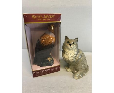 Royal Doulton "Golden Eagle" Whyte & Mackay whisky decanter, Empty and comes with its box. Together with Royal Doulton cat nu