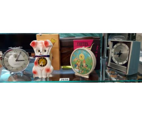 A boxed Vintage Smiths Noddy alarm clock and boxed googly eye dog clock etc, Collect Only 