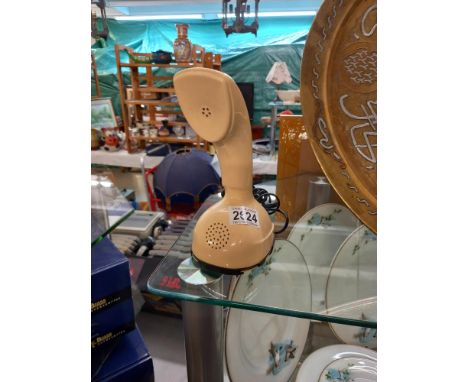 A vintage Ericson LM Ericofon dial telephone