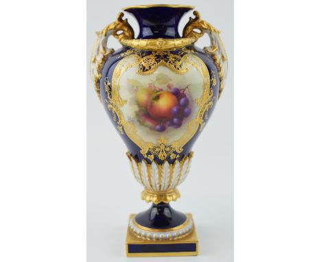 Royal Worcester hand painted fruit scene vase, signed by R Sebright, twin handled, gilt decoration on cobalt, 19.5cm tall.  I