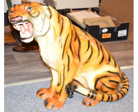 A large mid-century fireside ceramic Tiger. Height 52cm. Width 65cm.  Generally in good order and presents well, old repair t