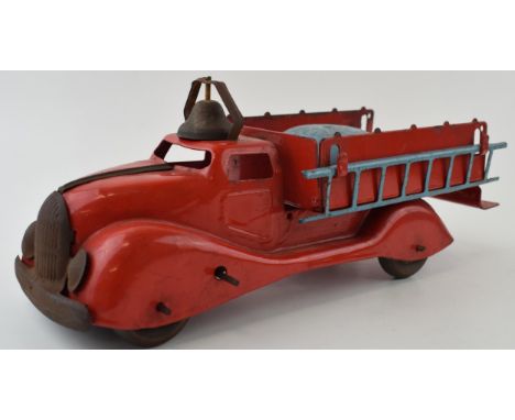 Pressed steel vintage friction toy. Possibly Wyandotte or Kelo. Art Deco style fire engine with working bell. Length 29cm, He