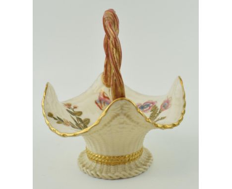 Royal Worcester rope twist handle, with butterflies and flowers, '992', 14cm tall.  In good condition with no obvious damage 